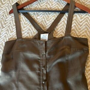 Button down dress with stylish side slits. 100% cupro  with polyester lining.